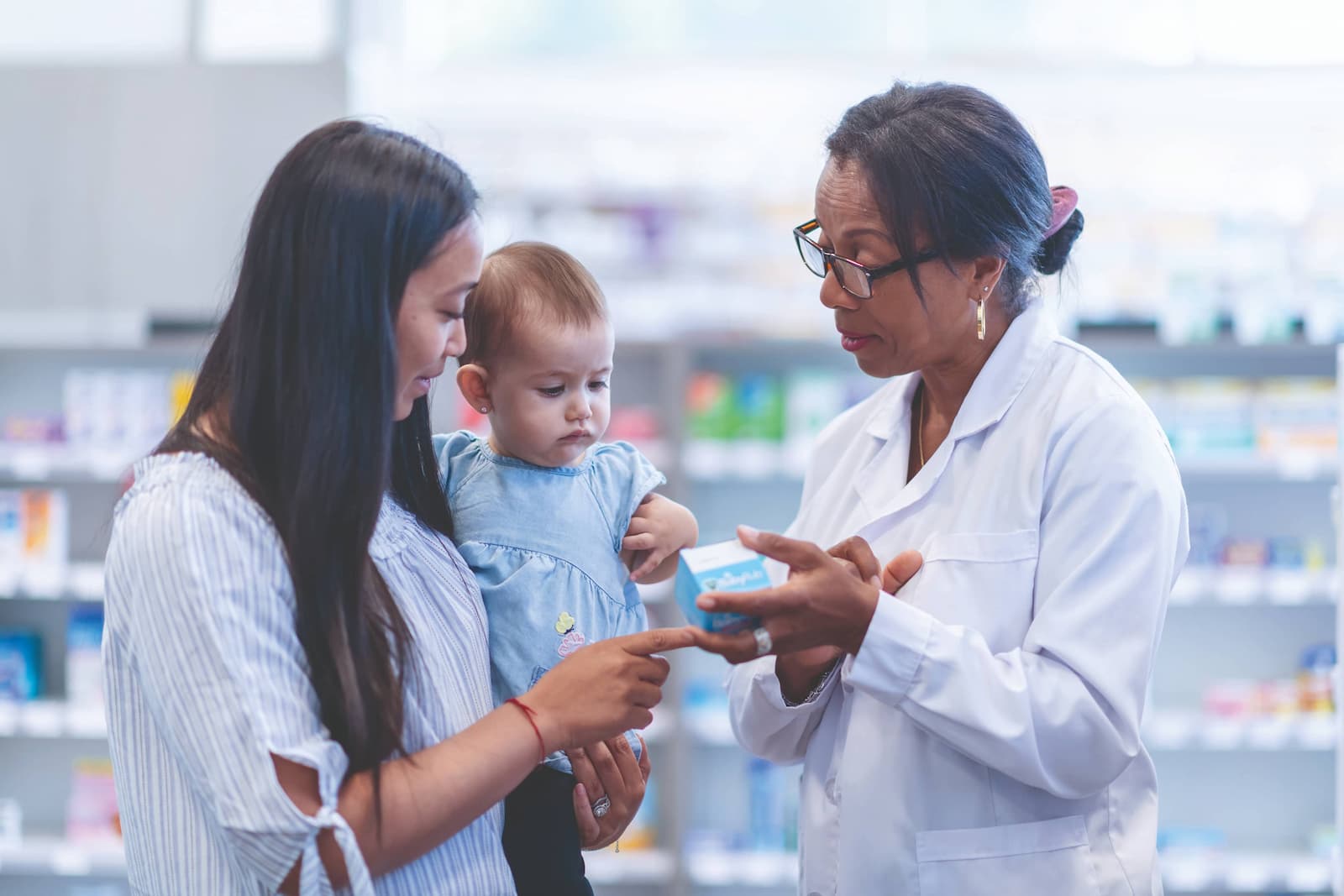 Image of baby with medicines